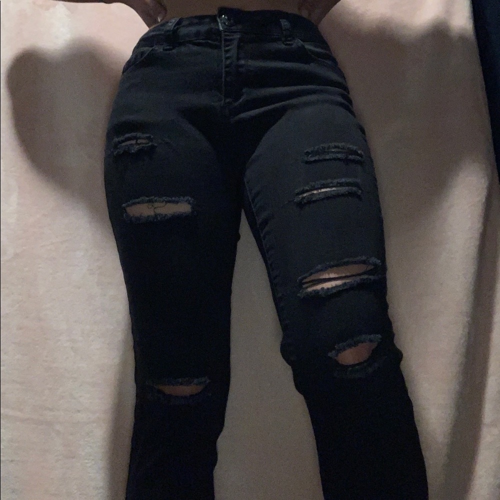 Black tight jeans with rips